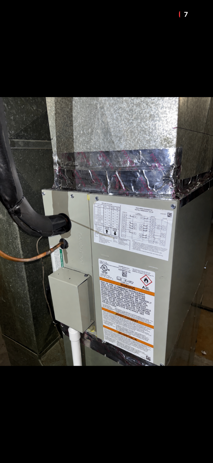 Residential condenser cleaned during preventative maintenance