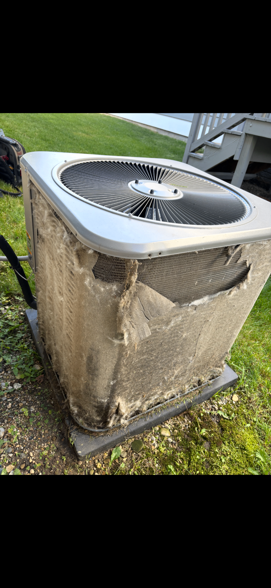 Before: severely clogged condenser coil reducing cooling efficiency